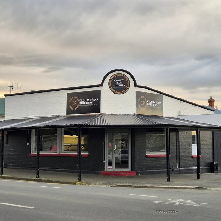 The Cloudy Peaks Butchery corner shopfront in Timaru by day